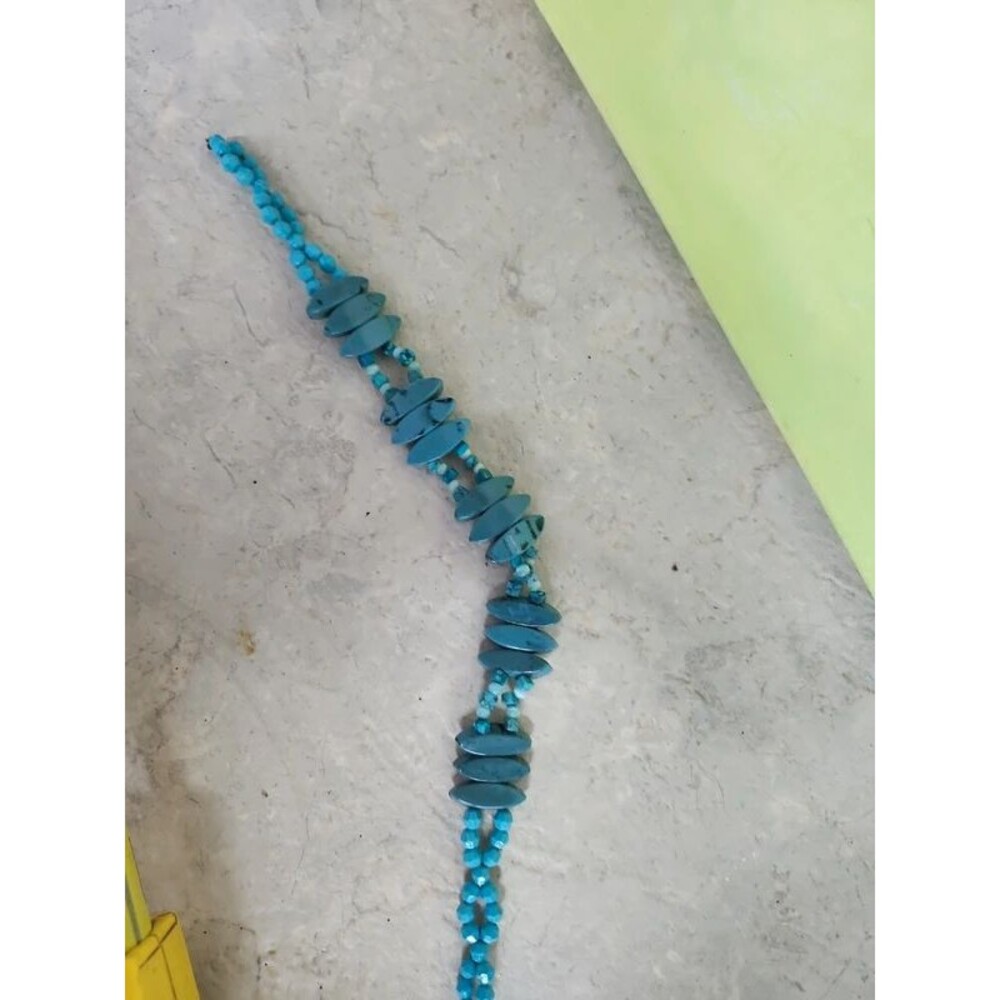 string of faux turquoise for jewelry making or hat band